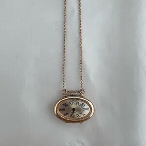 Vintage watch pendant.